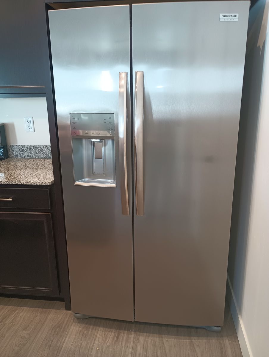 Side by side stainless steel refrigerator