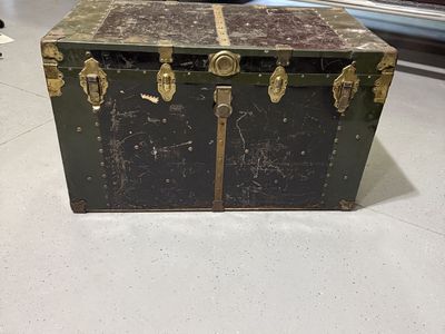Vintage metal steamer trunk
