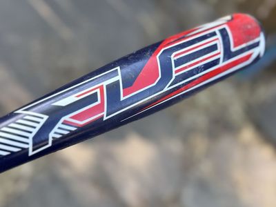 Rawlings Fuel 2-3/4" and RX4 Barrel Youth Baseball Bat - Pre-owned. Added ball caddy and bonus bat