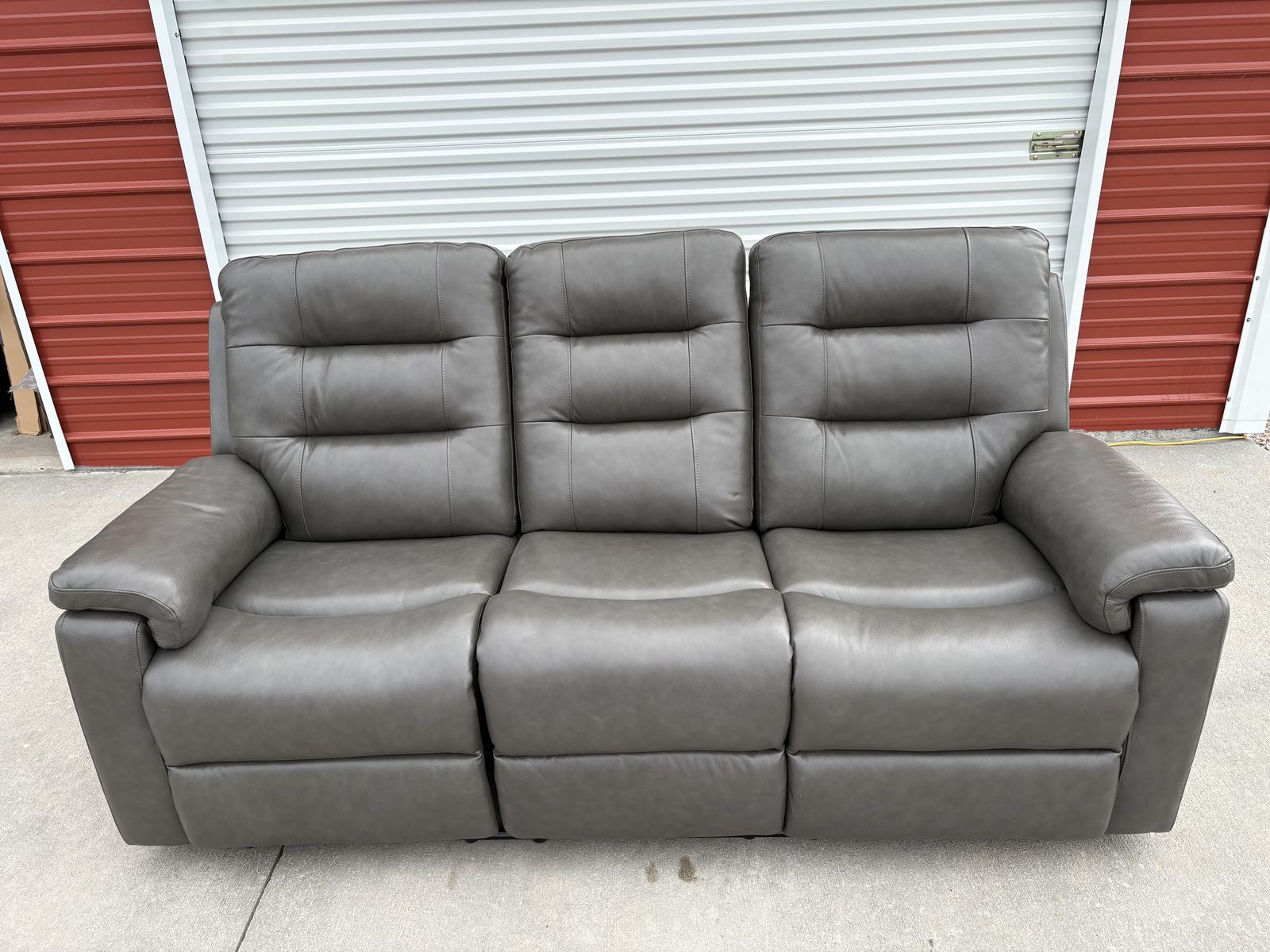 ABBYSON HOME GRAY LEATHER TRIPLE RECLING SOFA