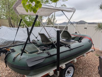 Sea Eagle STS-10 Inflatable fishing raft with motor and trailer