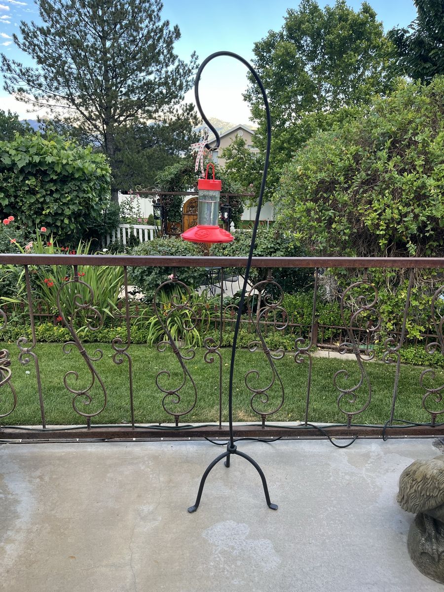 64” tall metal hook with build in stand.