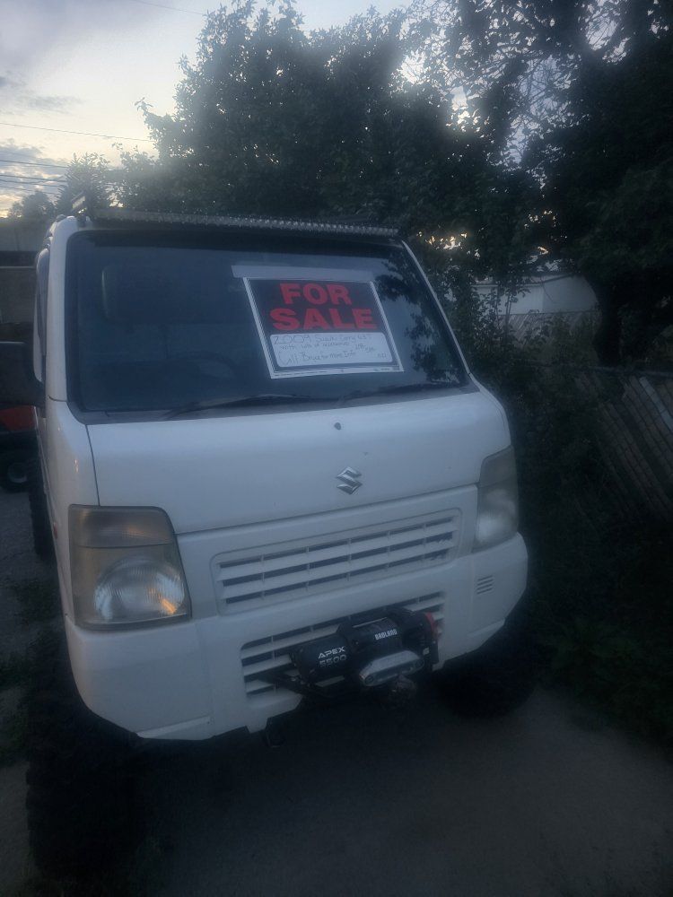 2009 Suzuki Carry 63T mini truck 4×4  right hand drive with lots of extras. Call for more info.