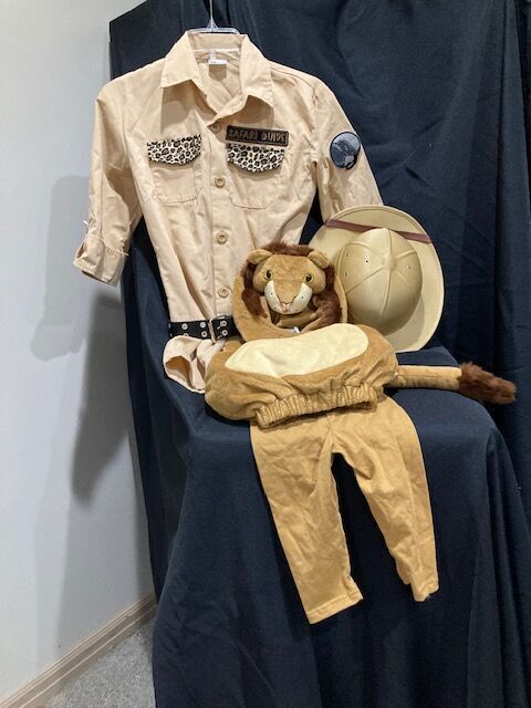 SAFARI GUIDE  and LION     Starting at    $15