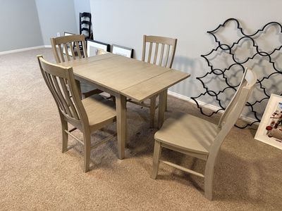 Table and 4 chairs. Solid wood -gray