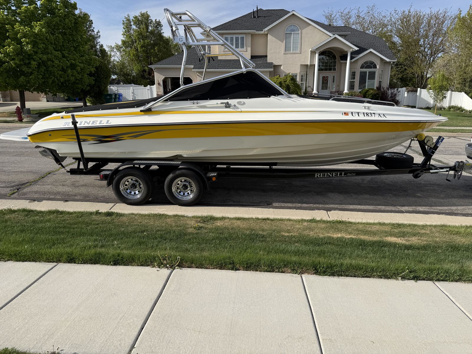2002 Reinell 240 BR Boat and Metal Craft Trailer for sale.