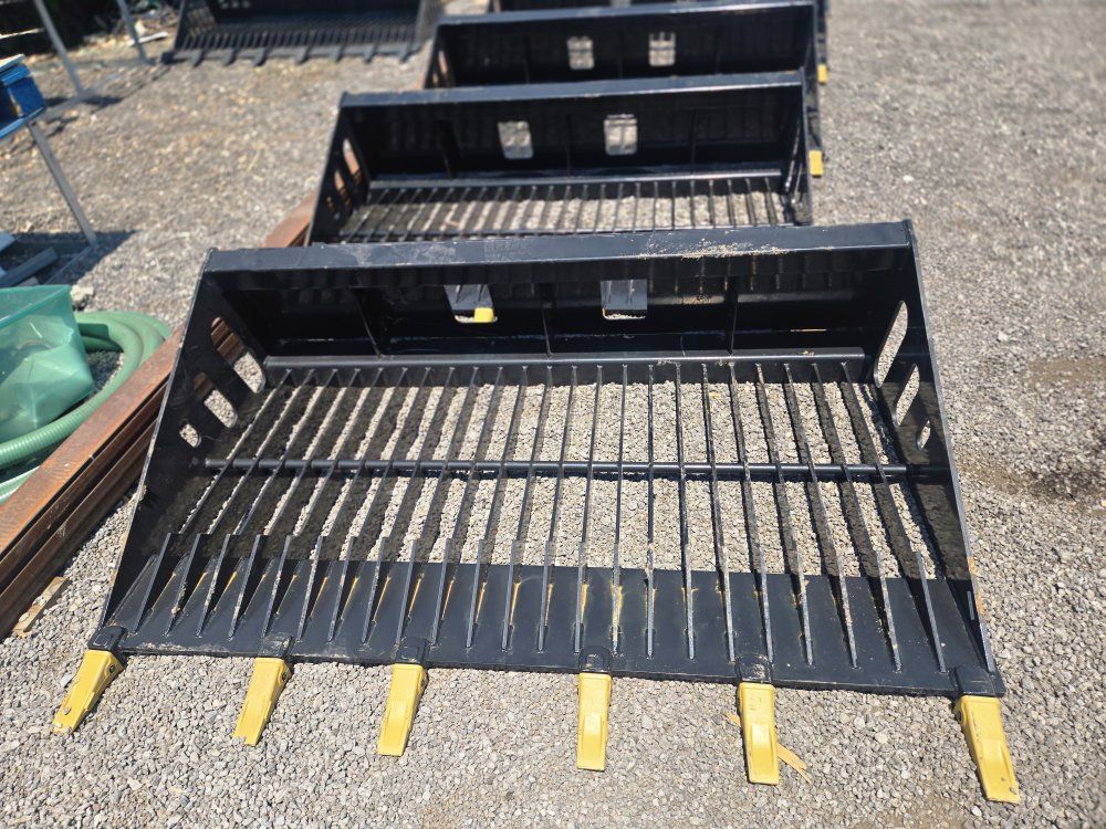 NEW Wolverine 67, 72, 78, 84" Heavy Duty Rock Bucket (Skid Steer)
Welded on Shanks & Replacable Bolted on Teeth.