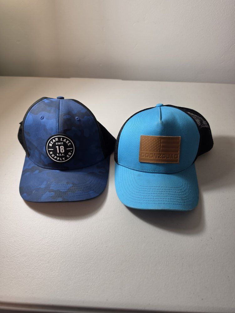 Blue Bear lake hat and YouTube Goonzquad hat.