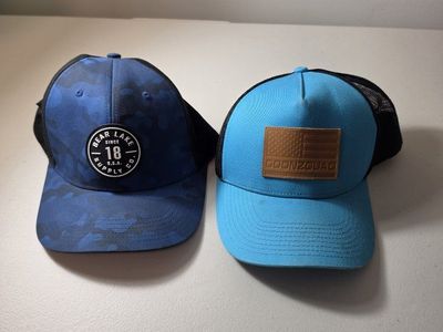 Blue Bear lake hat and YouTube Goonzquad hat.