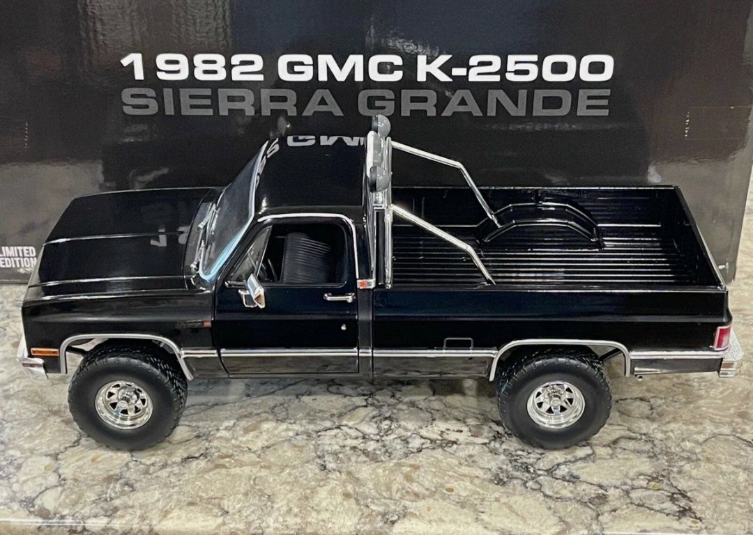 Greenlight 1982 GMC K-2500 Sierra Grande 1/18 Black Chrome Trim.