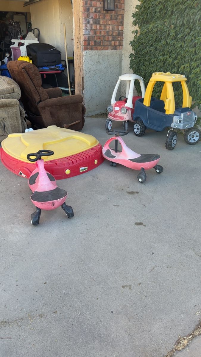 2 red PlasmaCar wiggle cars.