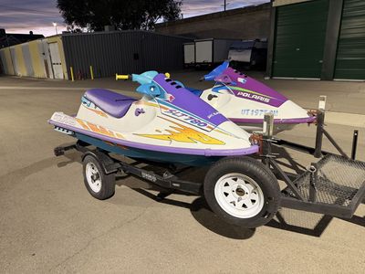 2 polished Polaris Jet Skis and trailer