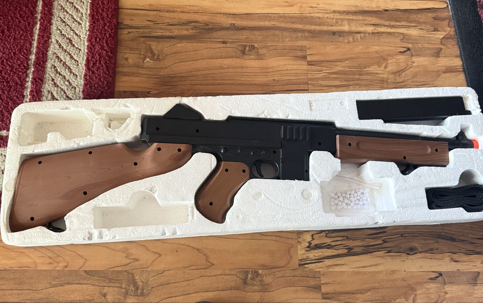 Double Eagle Thompson M306F spring-powered airsoft rifle.
