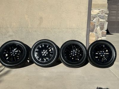 Brand New 20-inch Gloss Black painted aluminum w/ Hankook Dynapro AT2 all-terrain tires.