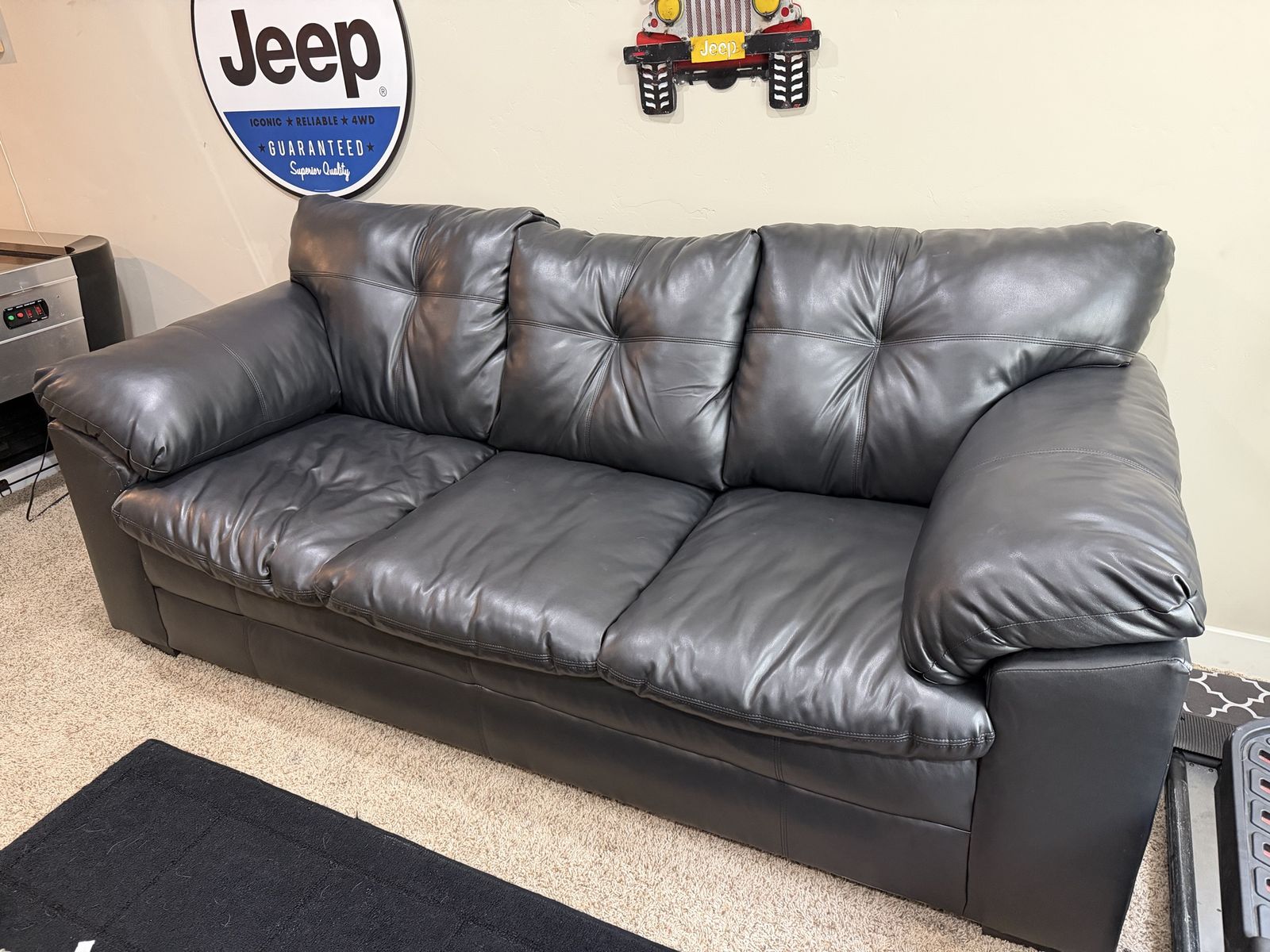 Black leather sofa and loveseat set