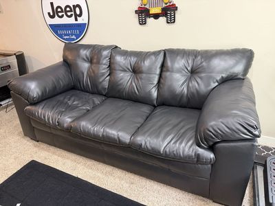 Black leather sofa and loveseat set