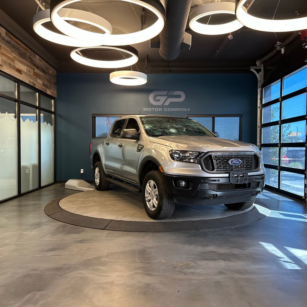 2021 Ford Ranger XL — rebuilt & branded title, 20% below market