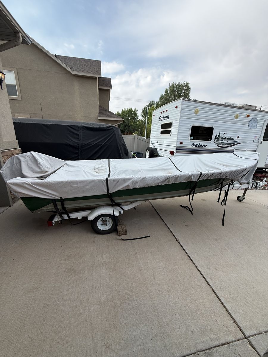 14ft sea king aluminum boat. Low hour 2022 tohatsu 4 stroke outboard. 