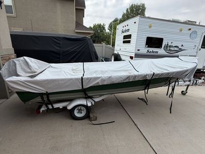 14ft sea king aluminum boat. Low hour 2022 tohatsu 4 stroke outboard.