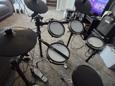 Simmons electronic drums. PDP double bass pedal