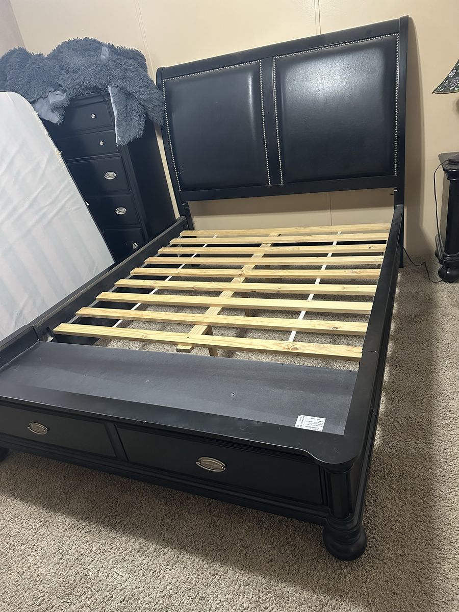 Very nice wood bed frame, and oversized blanket