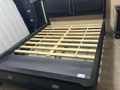 Very nice wood bed frame, and oversized blanket