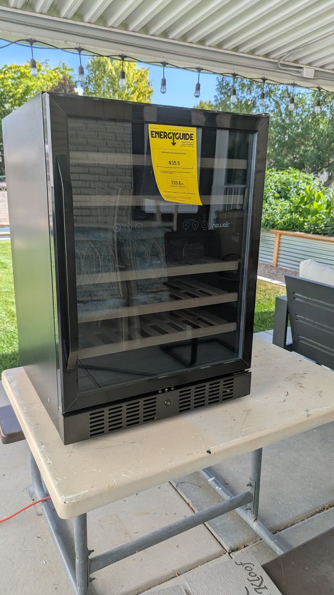 NewAir 24 inch dual zone 46 bottle wine fridge.