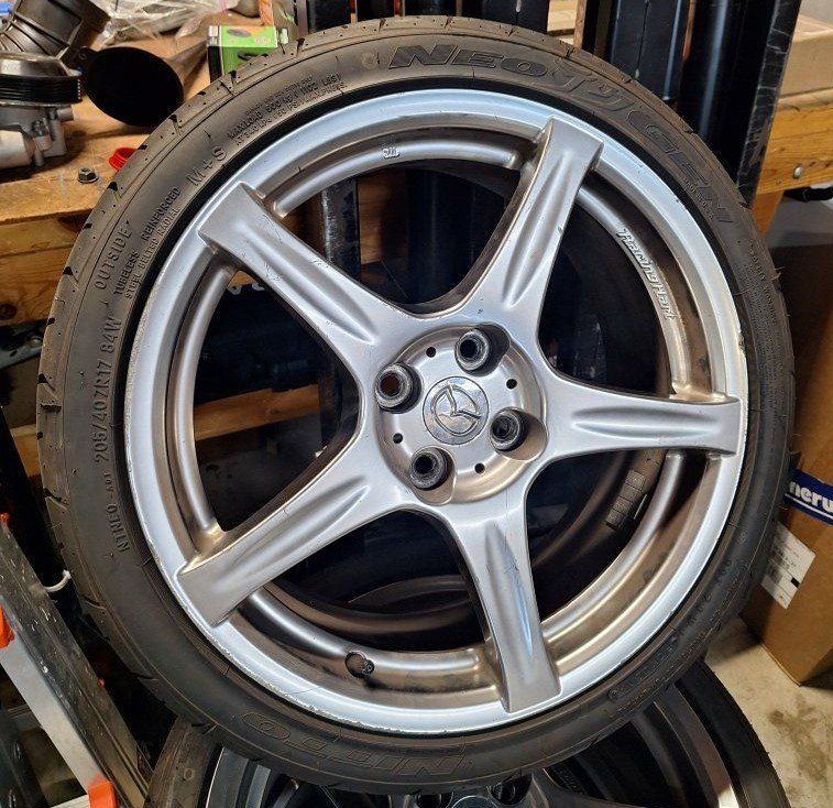 4x100 17x7 2004 mazda mx5 wheels.