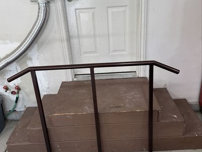Sturdy steps with custom metal handrail