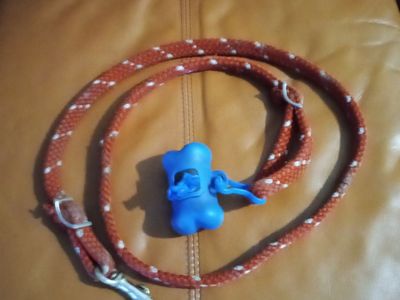 Rope dog leash with pet waste bone shaped bag dispenser and bags