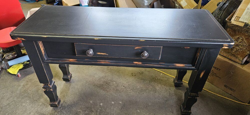 Small table with drawer.