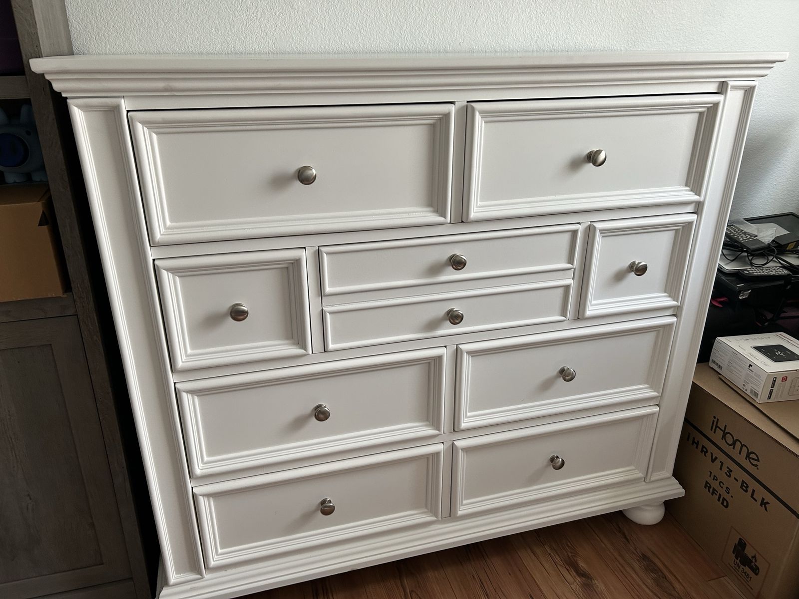 White Solid Wood 9-Drawer Dresser with Silver Knobs - 45"H x 50"L x 18"D