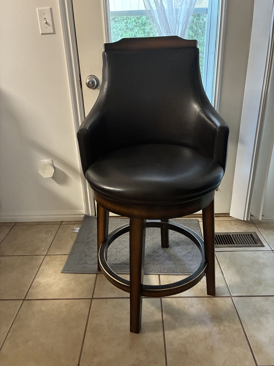Dark Brown Leather Swivel Bar Stools with Armrests and Wooden Frame