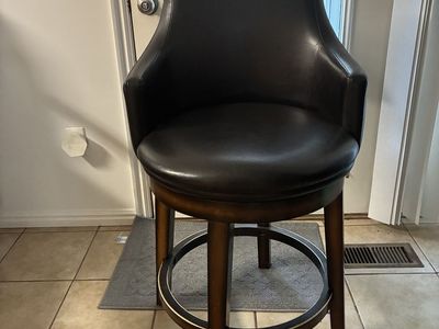 Dark Brown Leather Swivel Bar Stools with Armrests and Wooden Frame