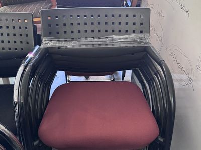 Stackable Office/Guest Chairs - Burnt Orange Fabric Seat, Black Frame, Space-Saving Design