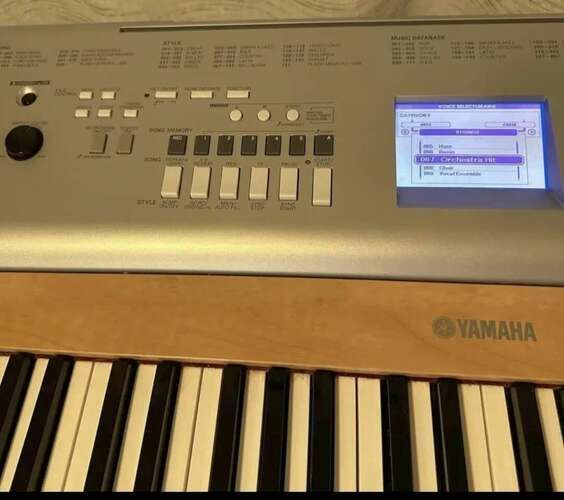 Yamaha YPG-635 88-Key Weighted  Portable Grand Piano/ keyboard with AC adapter, music holder, pedal, and  stand.