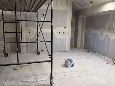 Laundry room cabinets, and clothing rod