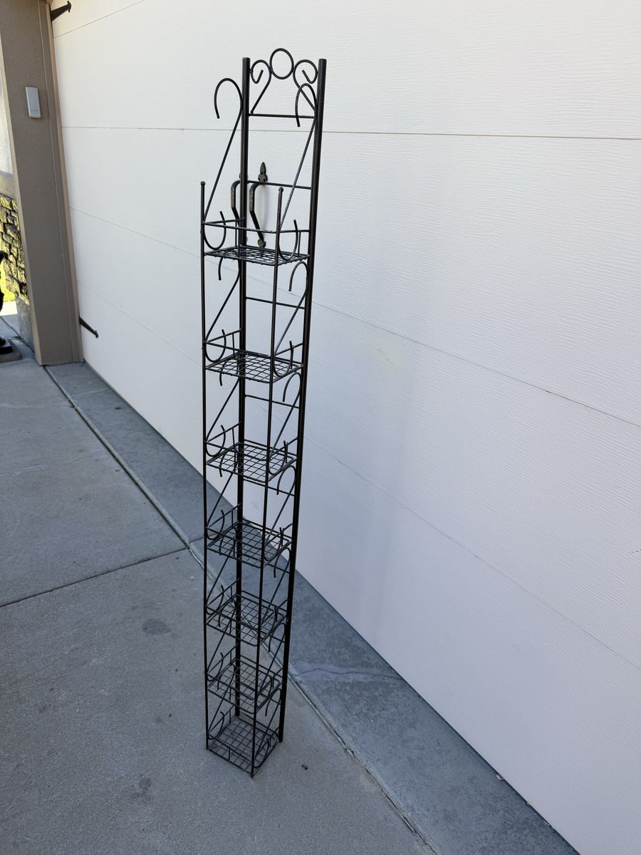 Tall vintage  all metal shelf rack 61” T X 6” W X 5 1/2” D