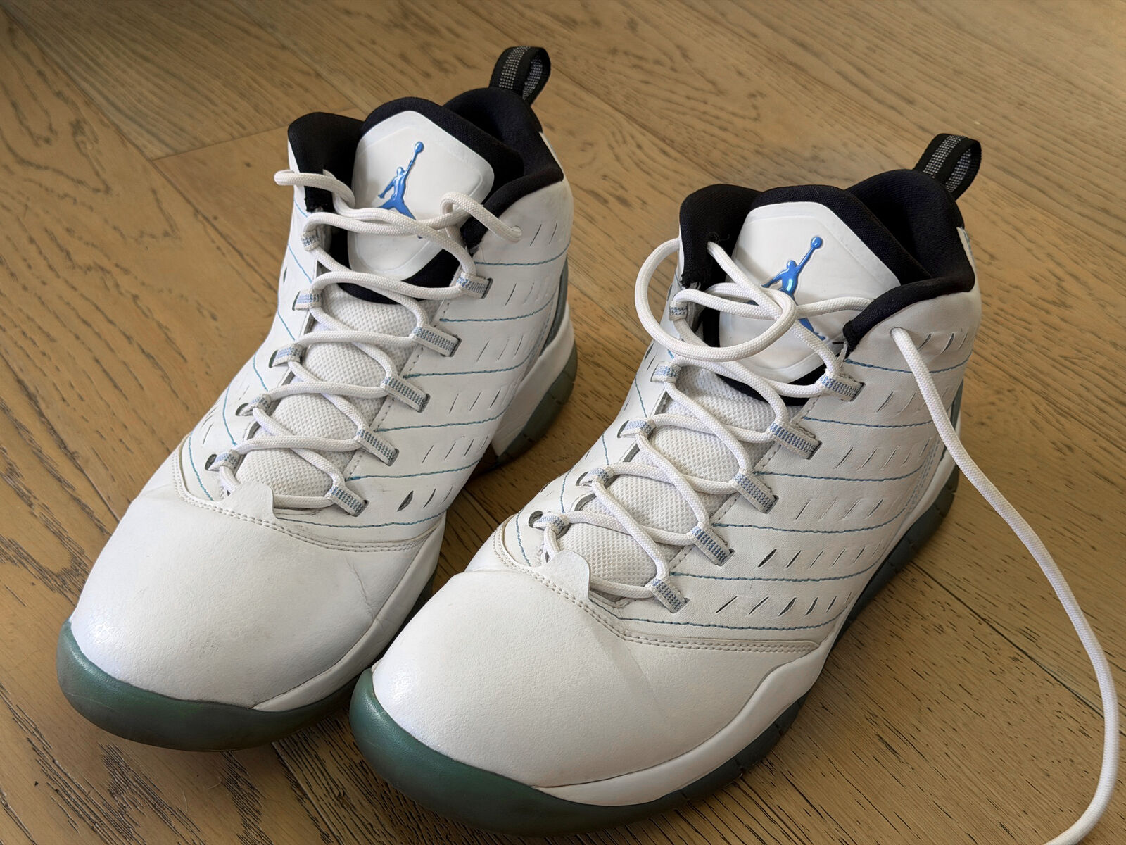 Air Jordan size 11.5 shoes. White and Carolina Blue. Michael Jordan