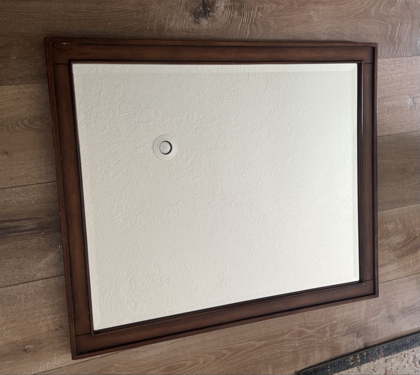 Two solid wood beveled mirrors