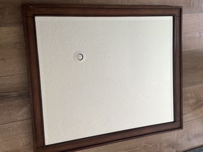 Two solid wood beveled mirrors