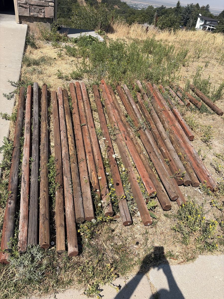FREE Lot of Used Round Wooden Fence Posts and Wood Posts