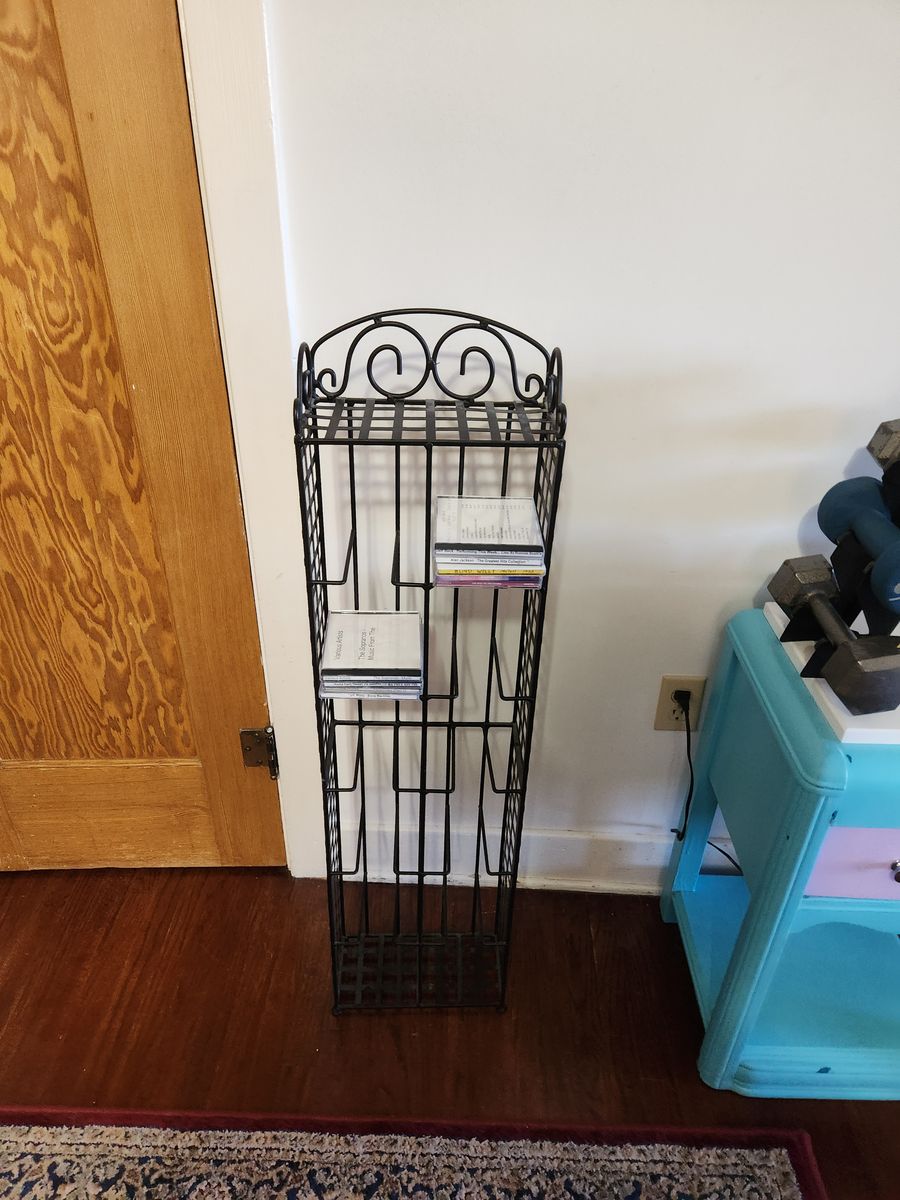 Cool metal cd rack.  Holds hundreds of CDs.  Welded metal.