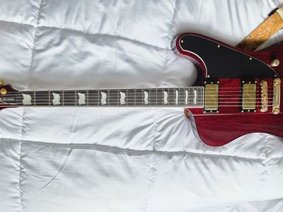 ESP LTD Phoenix-1000 solidbody electric guitar in See Thru Black Cherry with hardshell case