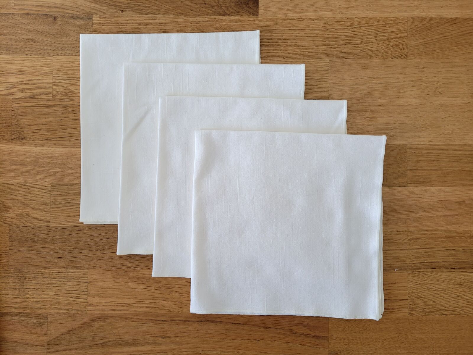4 Off White Napkins
