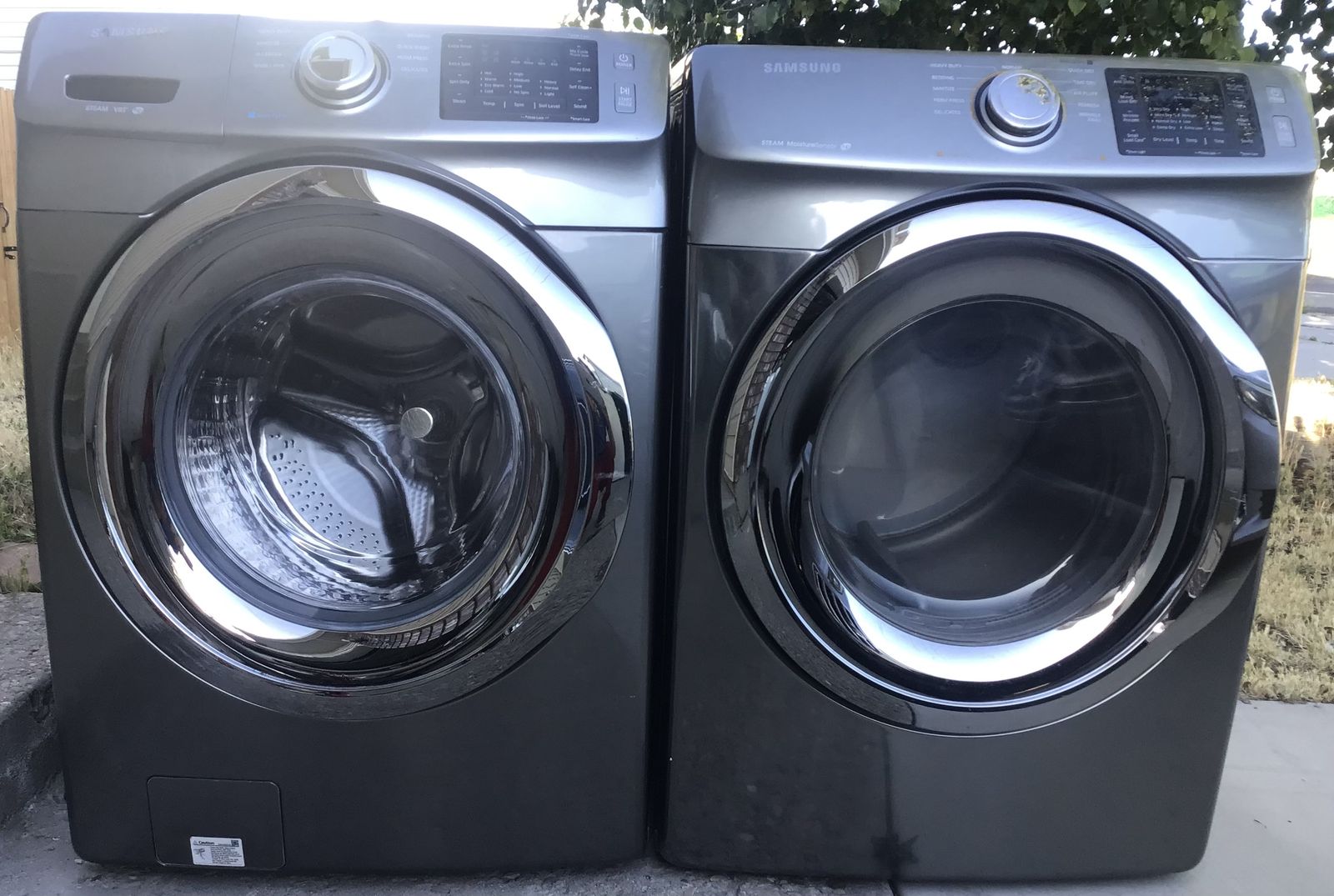 BEAUTIFUL SAMSUNG STAINLESS/PLATINUM FINISH STEAM SUPER CAPACITY STACKED/ SIDE BY SIDE SET INCLUDES FREE DELIVERY