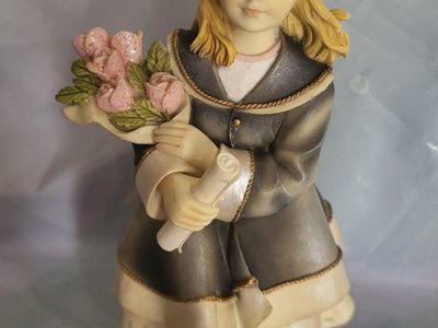 **NEW GRADUATE FIGURINE**