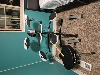 Roland electric drumset, with accessories.