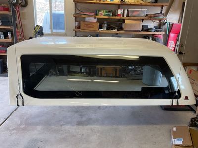 2017 -202? Ford Super Duty 6.8’ bed Leer Truck Cap White Shell Topper - Tinted Windows. Will not fit the newer beds with steps.