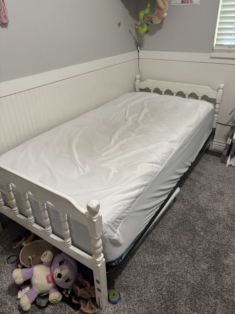 Twin white bed